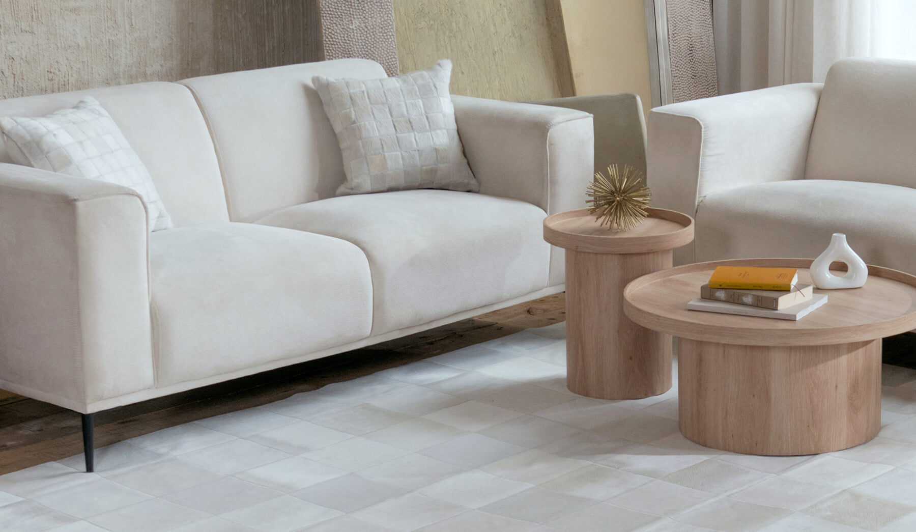 White Cowhide Patchwork Pillow Lifestyle