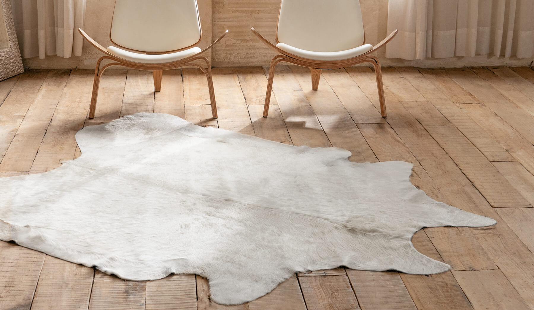 White cowhide rug collection