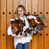 Tricolor cowhide pillow close-up showing natural color blend