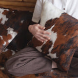 Tricolor cowhide pillow thumbnail — close-up of natural pattern