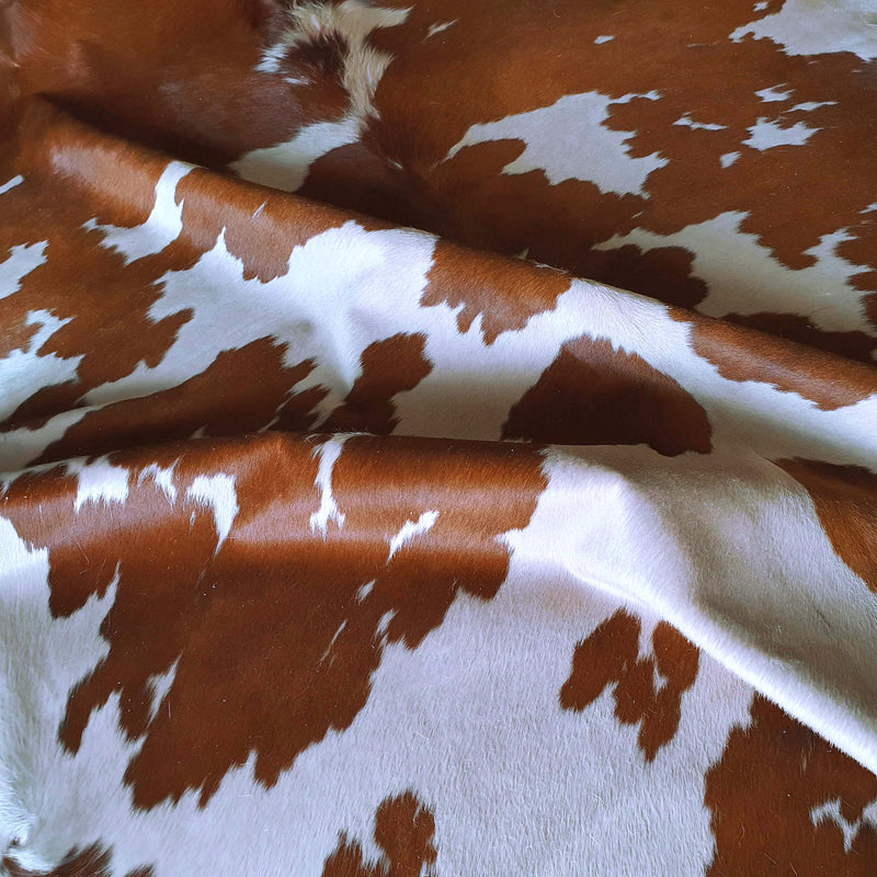 Brown and White Cowhide Pillow