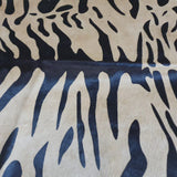 Tiger Javali on Caramel Cowhide Rug