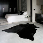 products/black_cowhide_rug_5__15568.1594043987.1280.1280.jpg